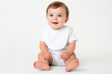 White bib baby portrait sitting.