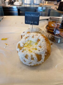 Skolebolle, Stortorget, Troms&oslash;, Norway - nostalgic treat skolebr&oslash;d for 52 NOK displayed at small caffe shop in town as a local specialty