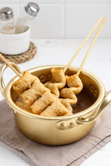 Odeng or Oden. Korean fish cakes.