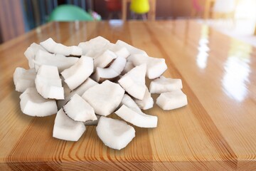 Fresh ripe coconut  slices on desk