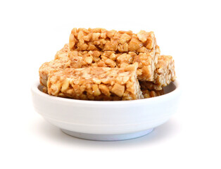Honey bars with peanuts, sesame and sunflower seeds isolated
