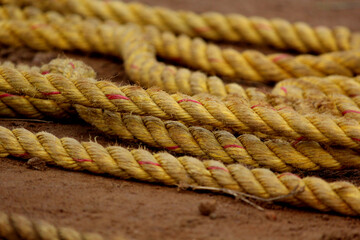 Fototapeta premium marine knot of thick brown rope