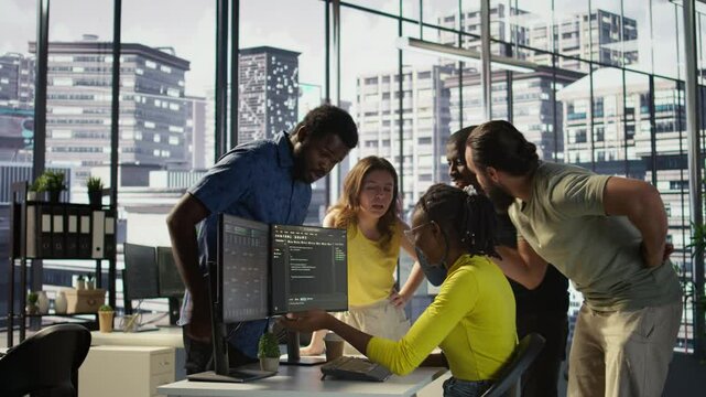 IT staff members arguing, having different ideas while testing and deploying programs and systems. Team of programmers fighting in office while checking code, having disagreement, camera B