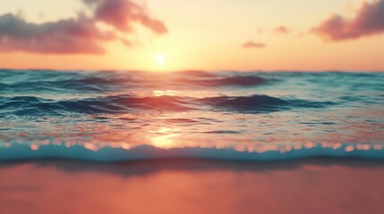 Fototapeta premium A beautiful sunset over the ocean with the sun reflecting on the water