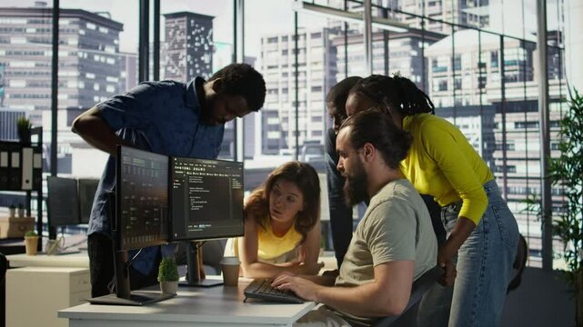 Programmers gathered together to conduct code review to fix errors, identifying technical issues with company software. Team of developers doing brainstorming, optimizing code, camera B