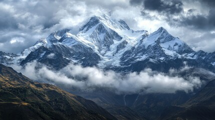 Obraz premium Majestic Snow-Capped Mountain Under Dramatic Sky