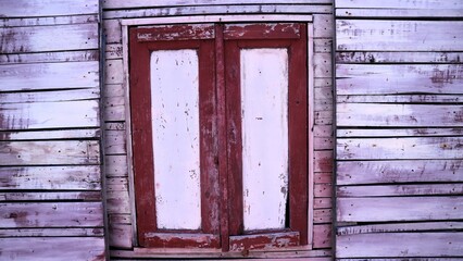 Vintage wooden window with textured cracked wall background, copy space