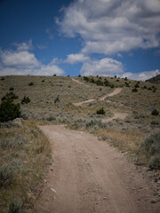 Curvy dirt OHV trail through Pipestone Montana recreation area