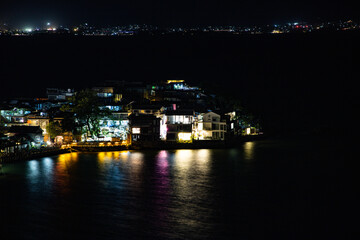 Obraz premium Shuanglang Ancient Town, Dali City, Yunnan Province - Aerial photography of urban buildings at night