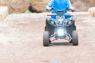 Children Riding Quad In The Forest On Holyday Period © daniele russo