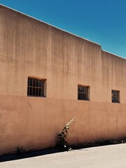 Adobe building against blue sky