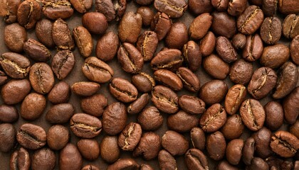 Fototapeta premium Coffee beans background, creating a rich and textured surface.