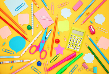 School supplies on yellow background
