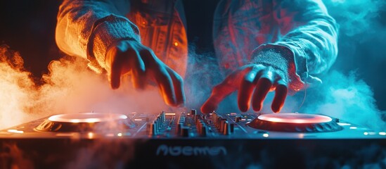 A DJ mixing music on a turntable with smoke in the background.