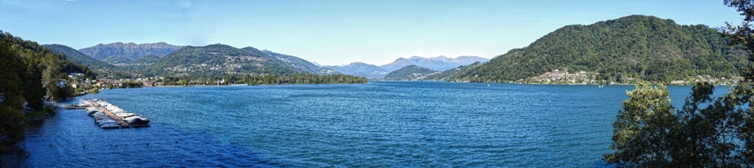 Panoramic image of the Lugano Lake jetty near Caslano.