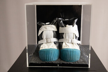 pair of space boots designed for extraterrestrial exploration in a display case at the museum