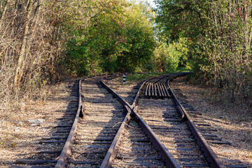 Railway tracks in the park area of ​​autumn Kharkov