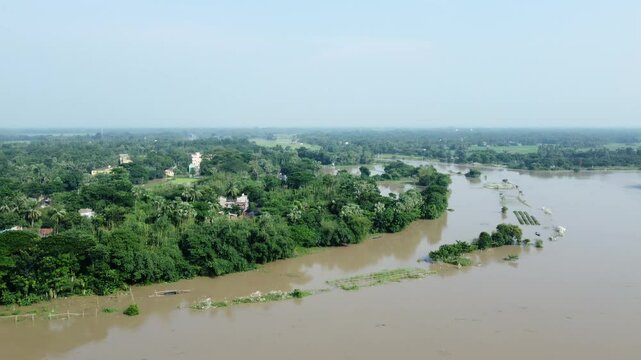 Ariel view shot of West Bengal flood by river Damodar and Mundeshwari in rainy season.