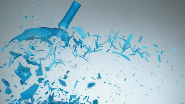 Glass vase breaking in super slow motion with shadow