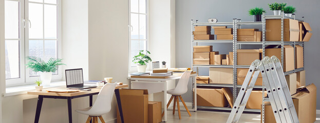 Empty warehouse of an online store or post office with shelves filled with parcels. Management of...