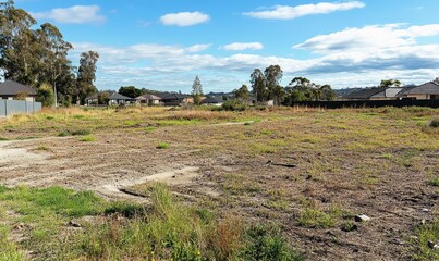 blocks of land cleared for new development in outer suburb