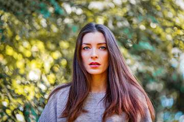 portrait of a woman in the forest in autumm