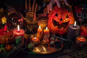 Illustration for celebrating Halloween party, spooky details and magical stuff, candles and pumpkins