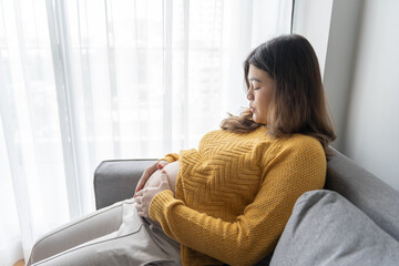 worried pregnant woman concerned and anxious woman in pregnancy overthinking worrying about pregnancy problem Pregnancy depression Mental health