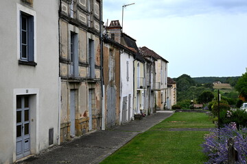 Old buildings on Place du Forail Nord in the bastide town of Monpazier, France