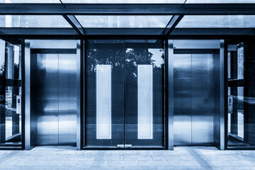 Sleek and Modern Elevator Entrance in Glass Building