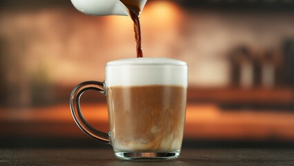 Pouring Coffee into Frothed Milk.