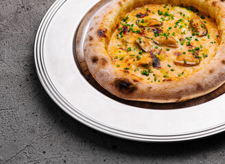 Gourmet mushroom pizza on elegant plate