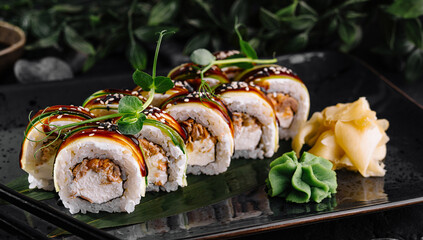 Gourmet sushi rolls on elegant slate plate