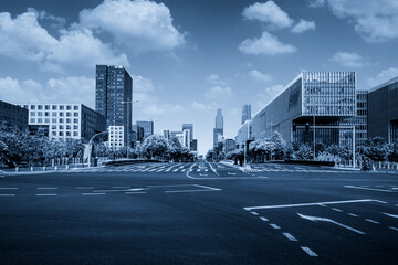 Obraz premium Serene Urban Landscape with Modern Architecture Under Bright Sky