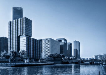 Obraz premium Contemporary Urban Cityscape with Modern Architecture by the Water