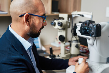 Optometrist Conducting Eye Examination with Advanced Technology in Modern Office Setting