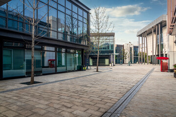 Contemporary Urban Plaza with Glass Buildings and Paved Walkways