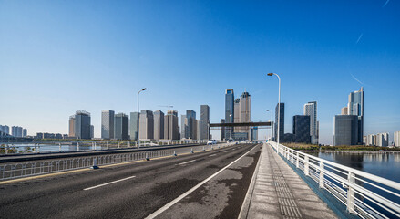 Naklejka premium City Skyline Viewed From Empty Bridge