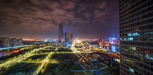 Vibrant Urban Nightscape with Illuminated Streets