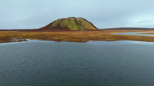 A Scenic Glimpse of Pingo Landmark, a Notable Geographical Feature Positioned Close to the Community of Tuktoyaktuk in the Northwest Territories (NWT), Canada - Drone Flying Forward