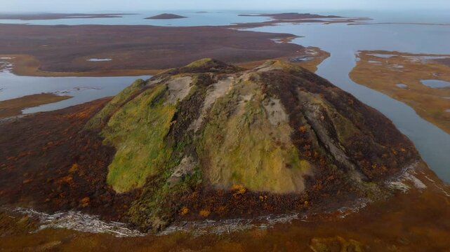 A Picturesque View of Pingo Landmark, a Famous Geographical Feature Located Near the Community of Tuktoyaktuk in the Northwest Territories (NWT), Canada - Orbit Drone Shot