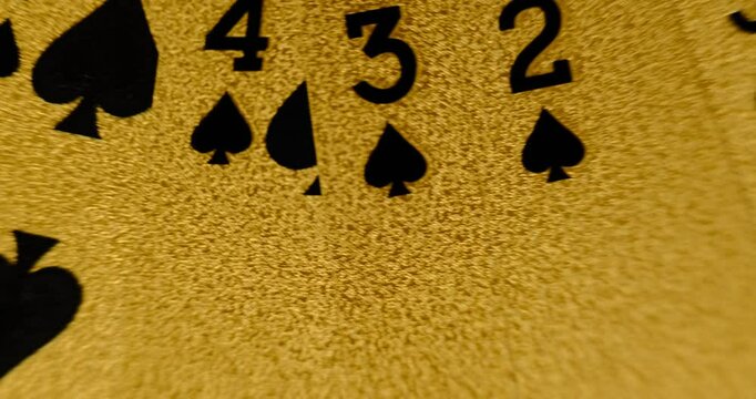 24K Gold Playing Cards in Motion on a Rotating Table