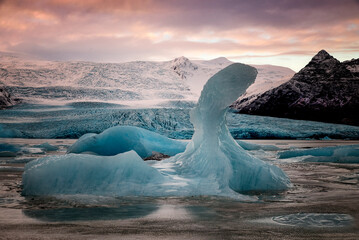 ice floes on the black sea sand and the coast Fjallsarlon lagoon