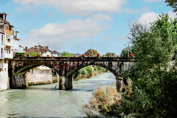 Fototapeta premium Discovering the village of Mauleon-Licharre crossed by its river Soule