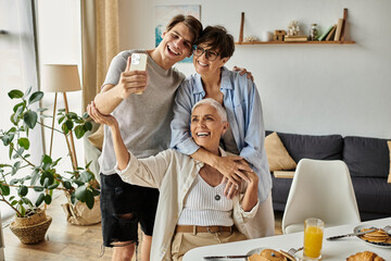 A loving LGBTQ family enjoys breakfast together, sharing laughter and creating cherished moments.
