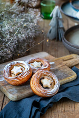 Traditional Christmas mince pies with dried fruits on a decorated table. English festive dessert.