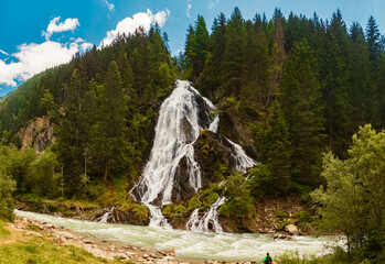 High resolution stitched alpine summer panorama at Haslacher Schleierwasserfall waterfall, Kals am Großglockner, Lienz, Eastern Tyrol, Austria