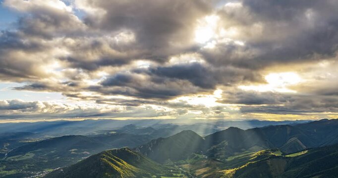 Magic sunset with clouds and golden light of sun motion fast in summer nature Time lapse