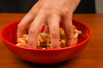 Unhealthy food for figure, heart, skin, teeth. Fast carbohydrates. Wooden background. Salty snack for beer. Junk food. Fast food. Snack. Cholesterol. Croutons. Croutons in bowl. Unhealthy food.