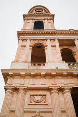 Frontal View Up of the Stone Facade of the Saint-Sulpice Church in Paris France